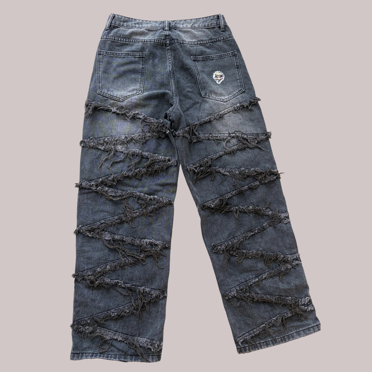 THE SHREDDED BLACK DENIM